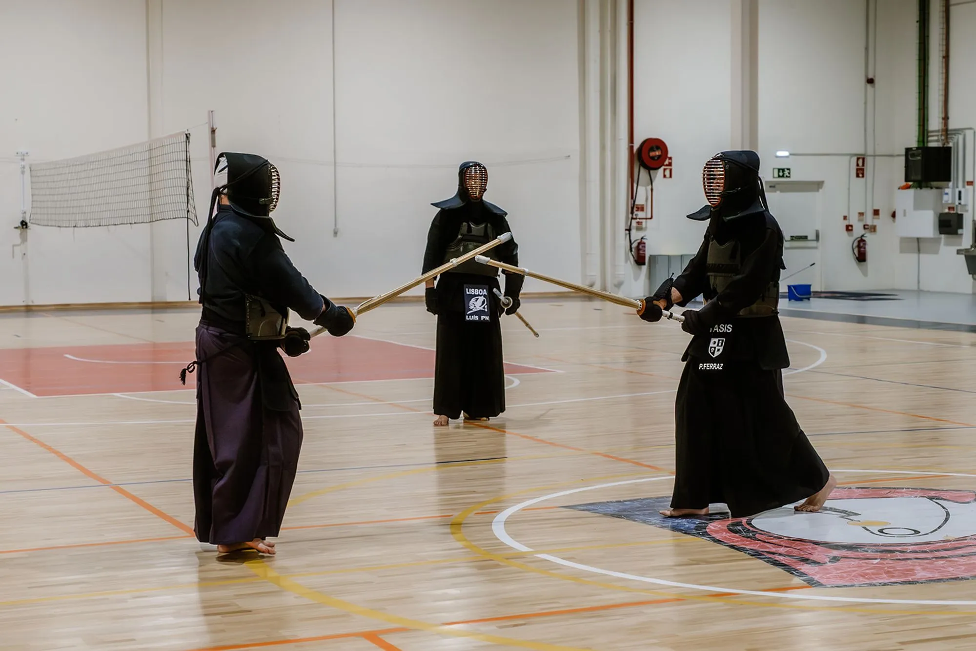 Two kendoka in kamae, holding distance