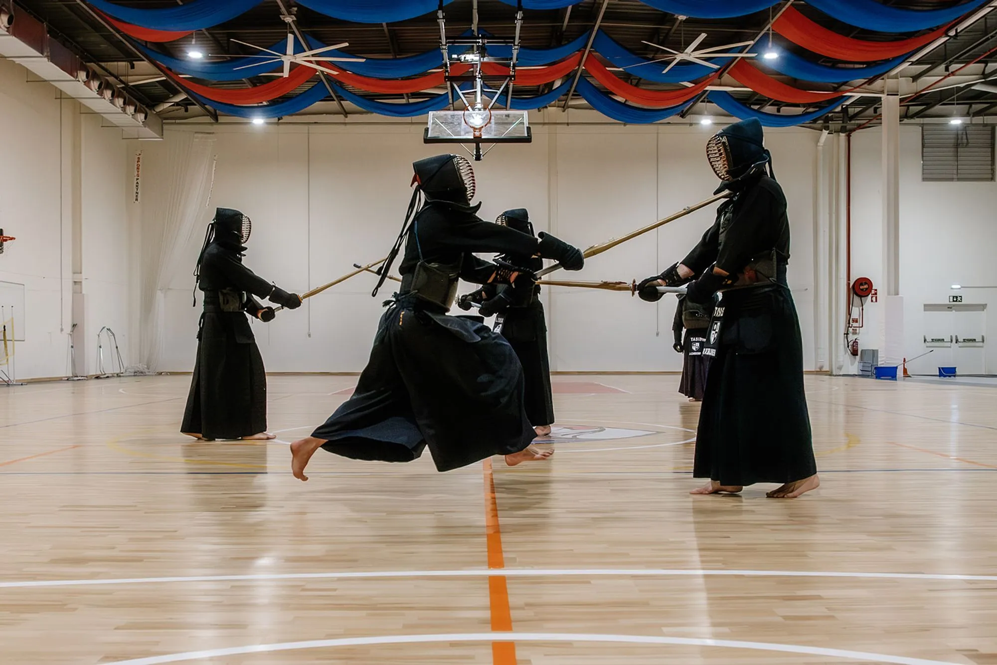 Several pairs training across the hall