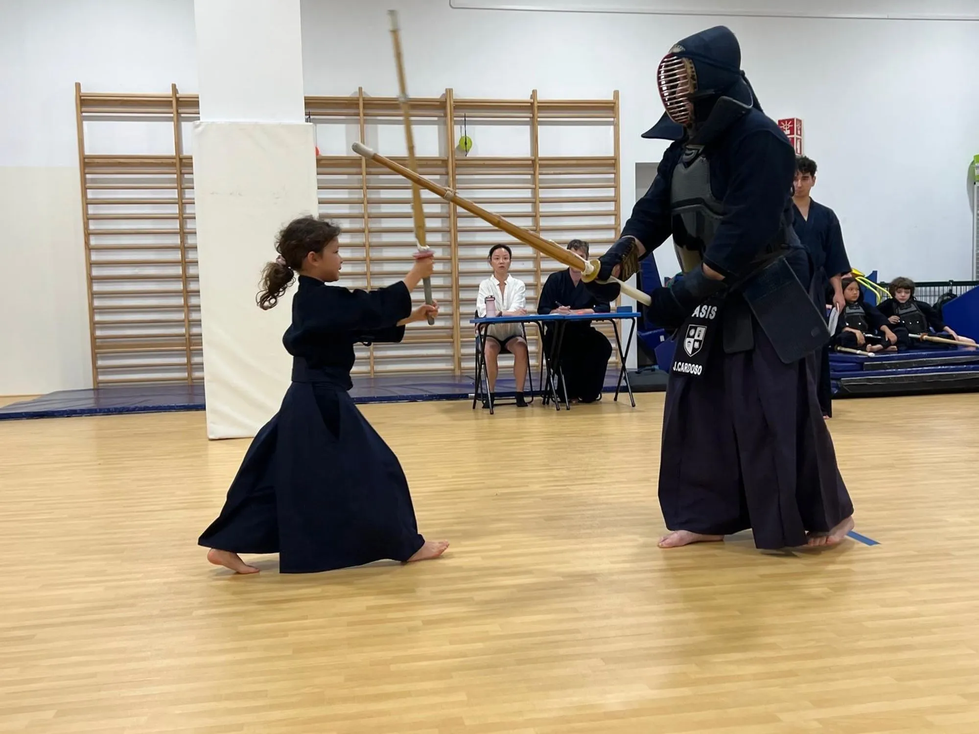 Two kendoka in a close exchange