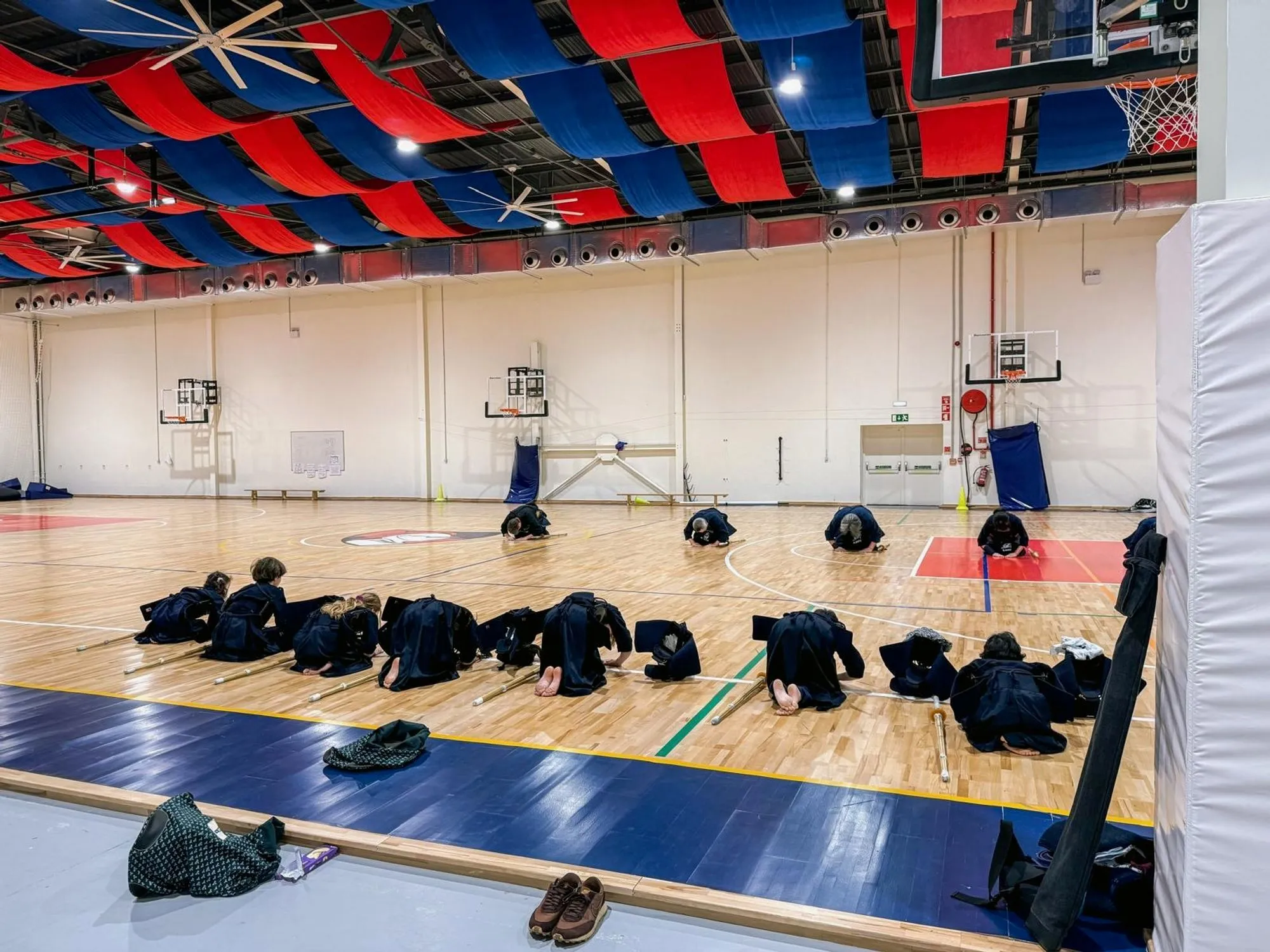 Kendoka seated in seiza with bogu laid out