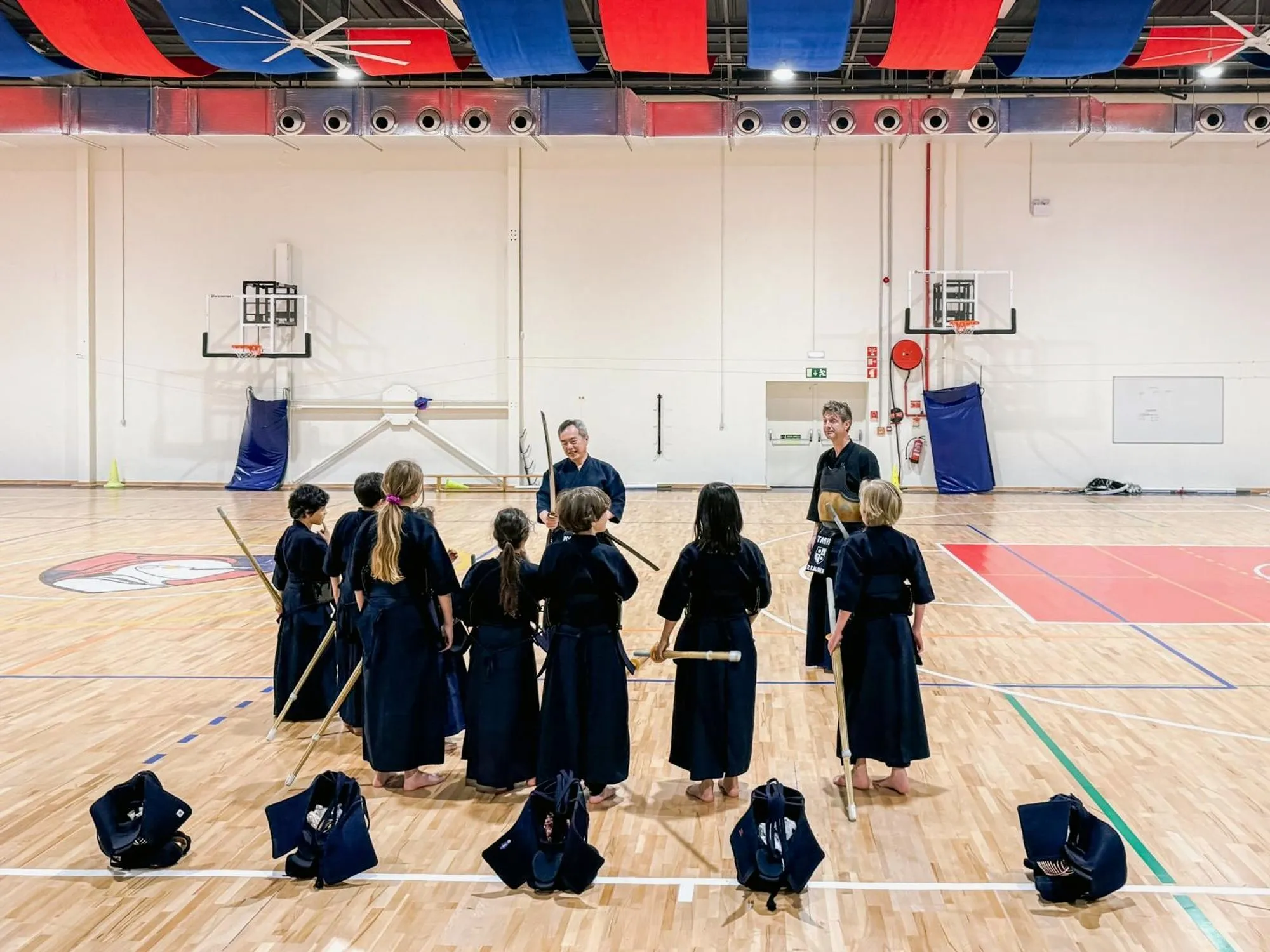 Young kendoka lined up for practice