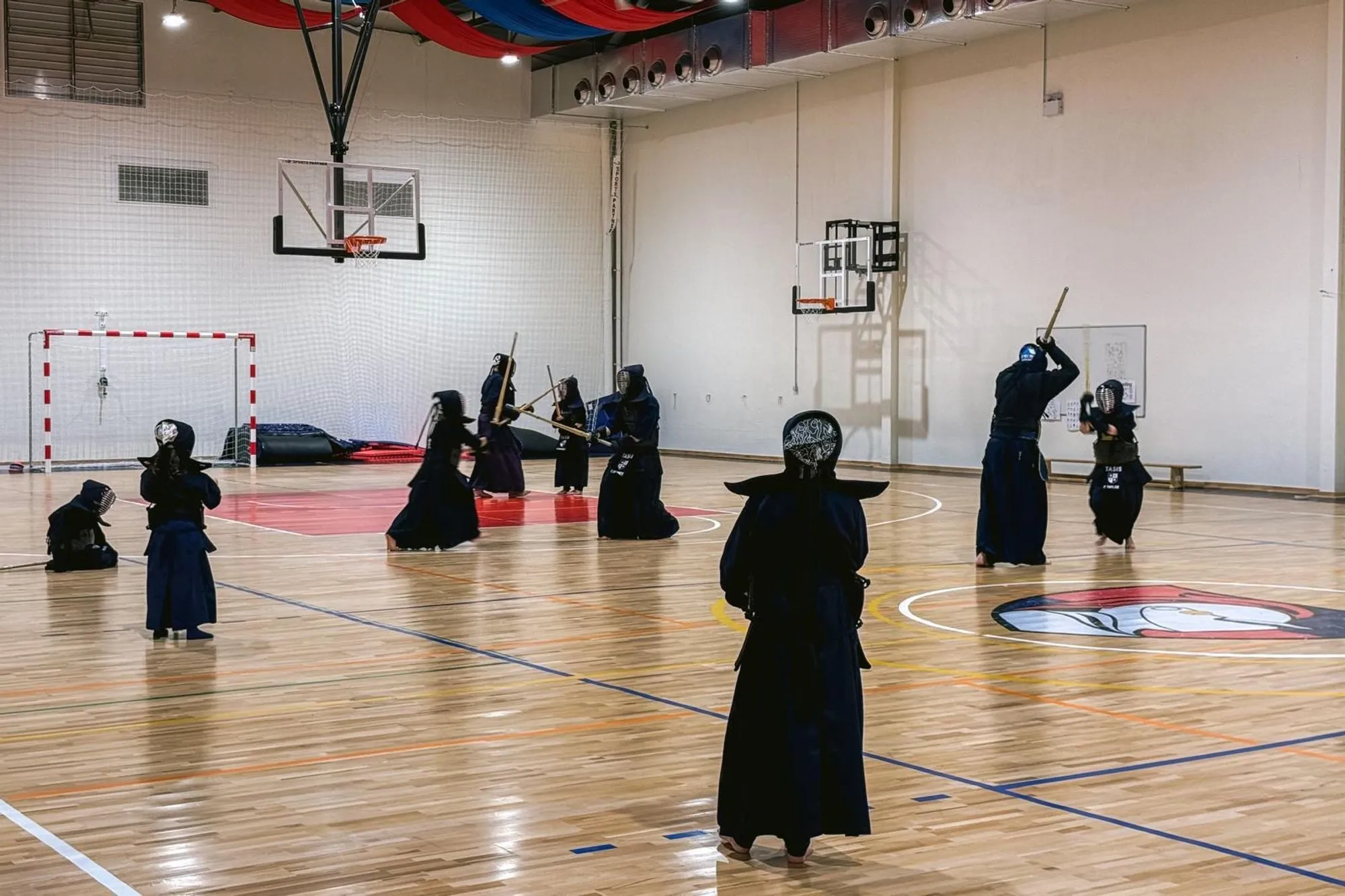 Kendoka spread across the competition floor