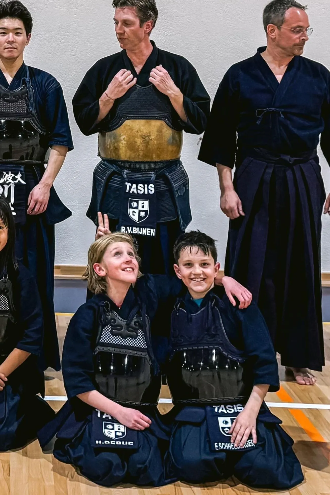 A club member and a young kendoka after the competition